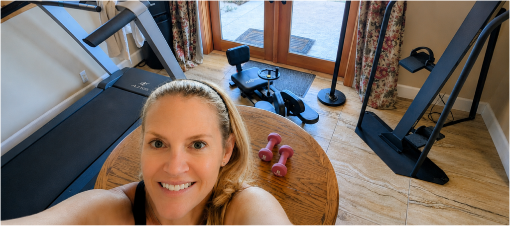 Home gym with exercise equipment and weights
